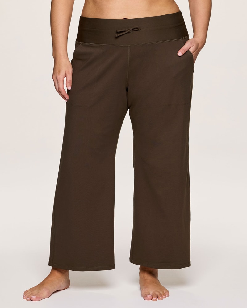 Front of a model wearing a size 2X Plus Super Soft Everyday Wide Leg Pant in Walnut by RBX Active. | dia_product_style_image_id:347016